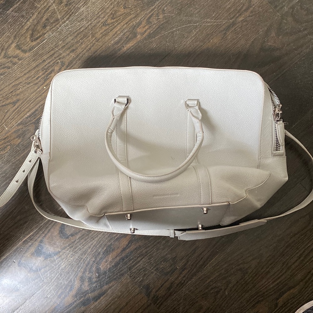 Alexander Wang leather messenger bag. Light scuffs on the bag. Luxury thrift.